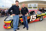KANSAS CITY, KS - OCTOBER 07:  (L-R) Team owner Michael Waltrip and driver Clint Bowyer pose by the #15 5-Hour Energy Toyota at Kansas Speedway on October 7, 2011 in Kansas City, Kansas. Waltrip announced that Clint Bowyer will join Michael Waltrip Racing for the 2012 Season.  (Photo by Jason Smith/Getty Images for NASCAR)