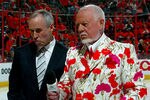 PHILADELPHIA - MAY 13:  Hockey commentators Ron Maclean and Don Cherry stand on the ice before the start of game three of the Eastern Conference Finals of the 2008 NHL Stanley Cup Playoffs between the Pittsburgh Penguins and the Philadelphia Flyers at Wachovia Center on May 13, 2008 in Philadelphia, Pennsylvania.  (Photo by Bruce Bennett/Getty Images)