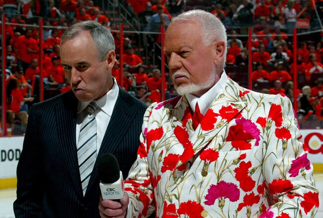 PHILADELPHIA - MAY 13:  Hockey commentators Ron Maclean and Don Cherry stand on the ice before the start of game three of the Eastern Conference Finals of the 2008 NHL Stanley Cup Playoffs between the Pittsburgh Penguins and the Philadelphia Flyers at Wachovia Center on May 13, 2008 in Philadelphia, Pennsylvania.  (Photo by Bruce Bennett/Getty Images)