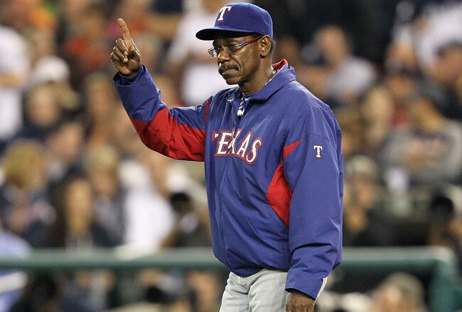 DETROIT, MI - OCTOBER 11:  Manager Ron Washington #38 of the Texas Rangers calls for a pitcher change against the Detroit Tigers in the sixth inning of Game Three of the American League Championship Series at Comerica Park on October 11, 2011 in Detroit, Michigan.  (Photo by Leon Halip/Getty Images)