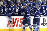 TORONTO, CANADA - OCTOBER 8: Phil Kessel #81 and John-Michael Liles #24 of the Toronto Maple Leafs celebrate Joffrey Lupul #19 goal against the Ottawa Senators during NHL action at the Air Canada Centre October 8, 2011 in Toronto, Ontario, Canada. (Photo by Abelimages/Getty Images)
