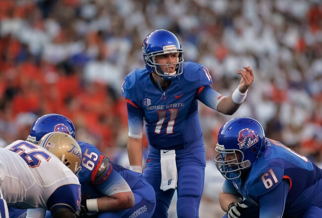 BOISE, ID - SEPTEMBER 24: Kellen Moore #11 of the Boise State Broncos calls a play against the Tulsa Golden Hurricane at Bronco Stadium on September 24, 2011 in Boise, Idaho.  (Photo by Otto Kitsinger III/Getty Images)