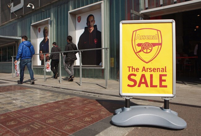 LONDON, ENGLAND - APRIL 11:  A sale sign is displayed outside the fan shop of Arsenal Football Club's Emirates Stadium on April 11, 2011 in London, England. American businessman Stan Kroenke's company 'Kroenke Sports Enterprises' has increased its shareholding in Arsenal to 62.89% and will make an offer for a full takeover of the club. Kronke first purchased 9.9% of Arsenal shares in 2007. Today's deal values the Premier League club at 731m GBP.  (Photo by Oli Scarff/Getty Images)
