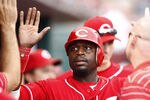 CINCINNATI, OH - SEPTEMBER 21:  Brandon Phillips #4 of the Cincinnati Reds receives congratulations after scoring during the game against the Houston Astros on September 21, 2011 at Great American Ball Park in Cincinnati, Ohio.  (Photo by John Grieshop/Getty Images)