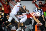LINCOLN, NE - OCTOBER 8: Running back Rex Burkhead #22 of the Nebraska Cornhuskers reaches for the end zone for the go ahead score during their game at Memorial Stadium October 8, 2011 in Lincoln, Nebraska. Nebraska defeated Ohio State 34-27. (Photo by Eric Francis/Getty Images)