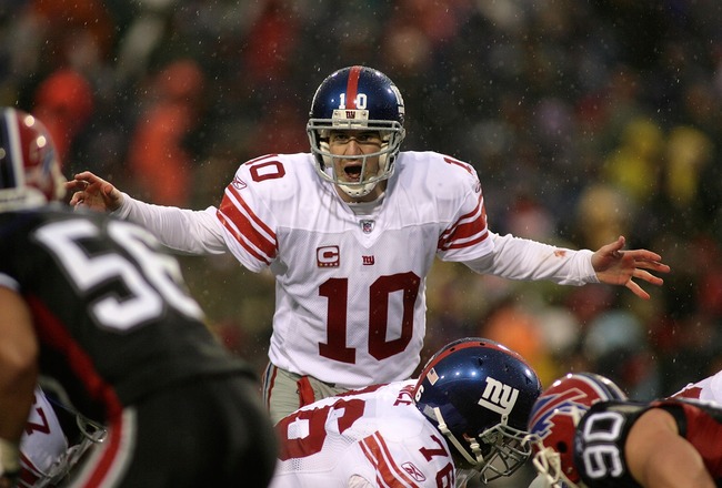 ORCHARD PARK, NY - DECEMBER 23:   Eli Manning #10 of the New York Giants calls signals against the Buffalo Bills on December 23, 2007 at Ralph Wilson Stadium in Orchard Park, New York. The Giants won 38-21. (Photo by Rick Stewart/Getty Images)