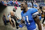 DETROIT, MI - OCTOBER 10:   Calvin Johnson #81 of the Detroit Lions leaves the field after defeating the Chicago Bears 24-13 at Ford Field on October 10, 2011 in Detroit, Michigan.  (Photo by Gregory Shamus/Getty Images)