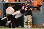 DENVER, CO - AUGUST 20:  Wide receiver Brandon Lloyd #84 of the Denver Broncos lays out but is unable to haul in a pass during the first half against the Buffalo Bills at Sports Authority Field at Mile High on August 20, 2011 in Denver, Colorado. (Photo by Justin Edmonds/Getty Images)
