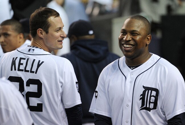 DETROIT, MI - OCTOBER 13:  Delmon Young #21 of the Detroit Tigers smiles with Don Kelly #32 in the sixth inning of Game Five of the American League Championship Series against the Texas Rangers at Comerica Park on October 13, 2011 in Detroit, Michigan.  (Photo by Harry How/Getty Images)