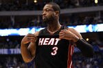 DALLAS, TX - JUNE 09:  Dwyane Wade #3 of the Miami Heat looks on during Game Five of the 2011 NBA Finals at American Airlines Center on June 9, 2011 in Dallas, Texas.  NOTE TO USER: User expressly acknowledges and agrees that, by downloading and/or using this Photograph, user is consenting to the terms and conditions of the Getty Images License Agreement.  (Photo by Mike Ehrmann/Getty Images)