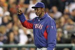 DETROIT, MI - OCTOBER 11:  Manager Ron Washington #38 of the Texas Rangers calls for a pitcher change against the Detroit Tigers in the sixth inning of Game Three of the American League Championship Series at Comerica Park on October 11, 2011 in Detroit, Michigan.  (Photo by Leon Halip/Getty Images)