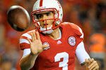 LINCOLN, NE - OCTOBER 8: quarterback Taylor Martinez #3 of the Nebraska Cornhuskers pitches the ball during their game against the Ohio State Buckeyes at Memorial Stadium October 8, 2011 in Lincoln, Nebraska. Nebraska Defeated Ohio State 34-27. (Photo by Eric Francis/Getty Images)