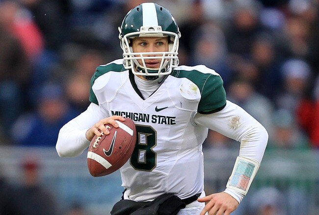 STATE COLLEGE, PA - NOVEMBER 27: Quarterback Kirk Cousins #8 of the Michigan State Spartans scrambles out of the pocket during a game against the Penn State Nittany Lions on November 27, 2010 at Beaver Stadium in State College, Pennsylvania. The Spartans won 28-22. (Photo by Hunter Martin/Getty Images)