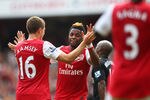 LONDON, ENGLAND - SEPTEMBER 24:  Alex Song of Arsenal celebrates his goal with team mate Bacary Sagna during the Barclays Premier League match between Arsenal and Bolton Wanderers at Emirates Stadium on September 24, 2011 in London, England.  (Photo by Clive Mason/Getty Images)