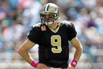 CHARLOTTE, NC - OCTOBER 09:  Drew Brees #9 of the New Orleans Saints against the Carolina Panthers during their game at Bank of America Stadium on October 9, 2011 in Charlotte, North Carolina.  (Photo by Streeter Lecka/Getty Images)