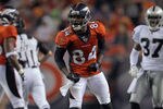 DENVER, CO - SEPTEMBER 12:  Wide receiver Brandon Lloyd #84 of the Denver Broncos celebrates his first down reception against the Oakland Raiders at Sports Authority Field at Mile High on September 12, 2011 in Denver, Colorado.  (Photo by Doug Pensinger/Getty Images)