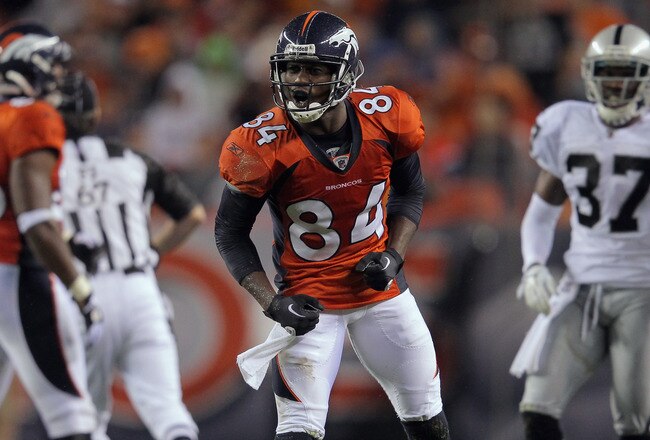 DENVER, CO - SEPTEMBER 12:  Wide receiver Brandon Lloyd #84 of the Denver Broncos celebrates his first down reception against the Oakland Raiders at Sports Authority Field at Mile High on September 12, 2011 in Denver, Colorado.  (Photo by Doug Pensinger/Getty Images)