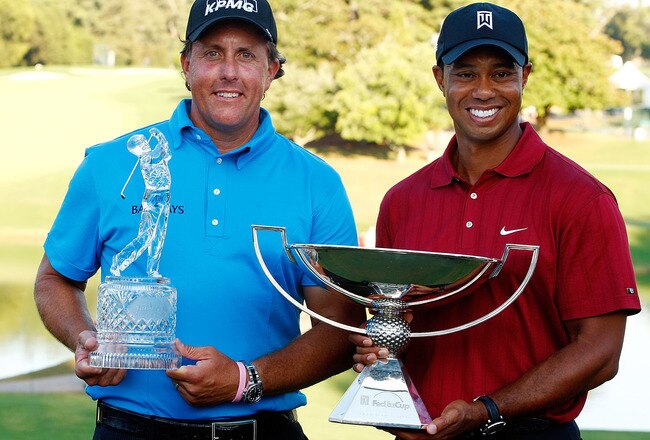 ATLANTA - SEPTEMBER 27:  Phil Mickelson (L), winner of THE TOUR Championship presented by Coca-Cola poses alongside Tiger Woods, winner of the 2009 FedExCup at East Lake Golf Club on September 27, 2009 in Atlanta, Georgia.  (Photo by Scott Halleran/Getty Images)
