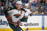 UNIONDALE, NY - OCTOBER 10:  Mikko Koivu #9 of the Minnesota Wild skates against the New York Islanders at Nassau Veterans Memorial Coliseum on October10, 2011 in Uniondale, New York. The Islanders defeated the Wild 2-1.  (Photo by Bruce Bennett/Getty Images)
