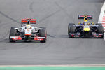 YEONGAM-GUN, SOUTH KOREA - OCTOBER 16:  Lewis Hamilton of Great Britain and McLaren leads from Mark Webber of Australia and Red Bull Racing during the Korean Formula One Grand Prix at the Korea International Circuit on October 16, 2011 in Yeongam-gun, South Korea.  (Photo by Clive Mason/Getty Images)