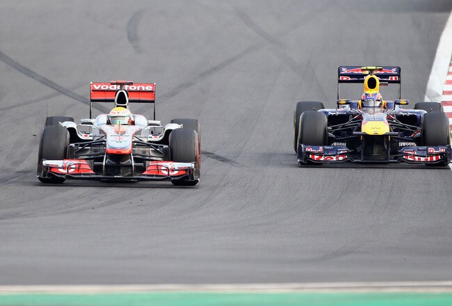 YEONGAM-GUN, SOUTH KOREA - OCTOBER 16:  Lewis Hamilton of Great Britain and McLaren leads from Mark Webber of Australia and Red Bull Racing during the Korean Formula One Grand Prix at the Korea International Circuit on October 16, 2011 in Yeongam-gun, South Korea.  (Photo by Clive Mason/Getty Images)