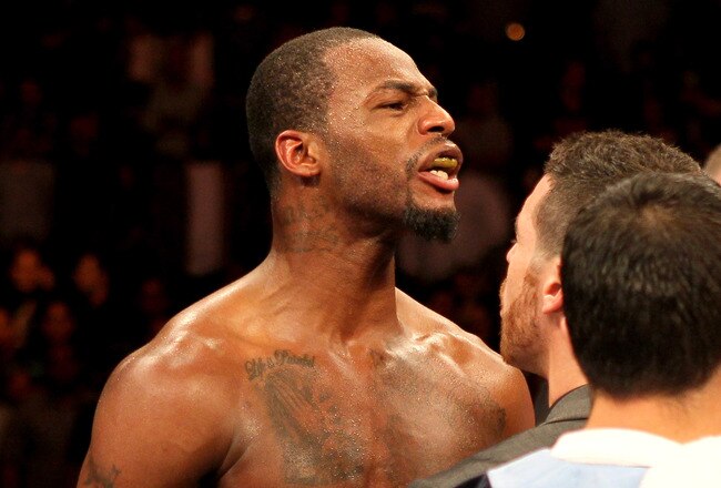 LOS ANGELES, CA - OCTOBER 15:  Bernard Hopkins  Chad Dawson yells across the ring at Bernard Hopkins  as they have word after a controversial ending to their WBC and Ring Magzine light heavyweight title fight at Staples Center on October 15, 2011 in Los Angeles, California. Dawson was awarded a second round TKO.  (Photo by Stephen Dunn/Getty Images)