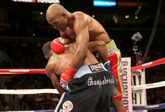 LOS ANGELES, CA - OCTOBER 15:  Bernard Hopkins (R) tangles with Chad Dawson as he falls to the canvas  in their WBC and Ring Magzine light heavyweight title fight at Staples Center on October 15, 2011 in Los Angeles, California. Hopkins injured his shoulder and was unable to continue and Dawson was awarded a TKO victory.  (Photo by Stephen Dunn/Getty Images)