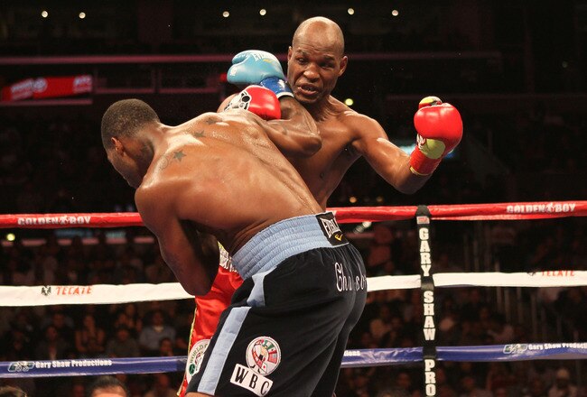 LOS ANGELES, CA - OCTOBER 15:  Bernard Hopkins (R) and Chad Dawson exchange punches in their WBC and Ring Magzine light heavyweight title fight at Staples Center on October 15, 2011 in Los Angeles, California. Dawson was awarded a second round TKO after Hopkins injured his shoulder.  (Photo by Stephen Dunn/Getty Images)