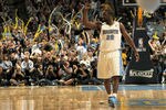 DENVER, CO - APRIL 25:  Raymond Felton #20 of the Denver Nuggets celebrates late in the fourth quarter against the Oklahoma City Thunder in Game Four of the Western Conference Quarterfinals in the 2011 NBA Playoffs on April 24, 2011 at the Pepsi Center in Denver, Colorado. The Nuggets defeated the Thunder 104-101. NOTE TO USER: User expressly acknowledges and agrees that, by downloading and or using this photograph, User is consenting to the terms and conditions of the Getty Images License Agreement.  (Photo by Doug Pensinger/Getty Images)