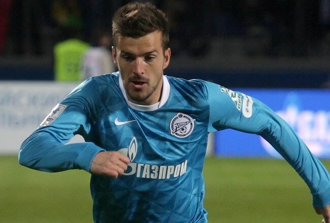 ST. PETERSBURG, RUSSIA - OCTOBER 15: Aleksandar Lukovic (L) of FC Zenit St. Petersburg battles for the ball with Aleksandr Kokorin of FC Dynamo Moscow during the Russian Football League Championship match between FC Zenit St. Petersburg and FC Dynamo Moscow at the Petrovsky Stadium on October 15, 2011 in St. Petersburg, Russia. (Photo by Rostislav Koshelev/Epsilon/Getty Images)