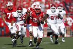 MADISON, WI - OCTOBER 15: James White #20 of the Wisconsin Badgers breaks away on a 35-yard run in the first half against the Indiana Hoosiers at Camp Randall Stadium on October 15, 2011 in Madison, Wisconsin. The Badgers won 59-7. (Photo by Joe Robbins/Getty Images)