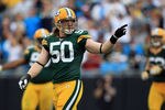 CHARLOTTE, NC - SEPTEMBER 18:   A.J. Hawk #50 of the Green Bay Packers during their game against the Carolina Panthers at Bank of America Stadium on September 18, 2011 in Charlotte, North Carolina.  (Photo by Streeter Lecka/Getty Images)