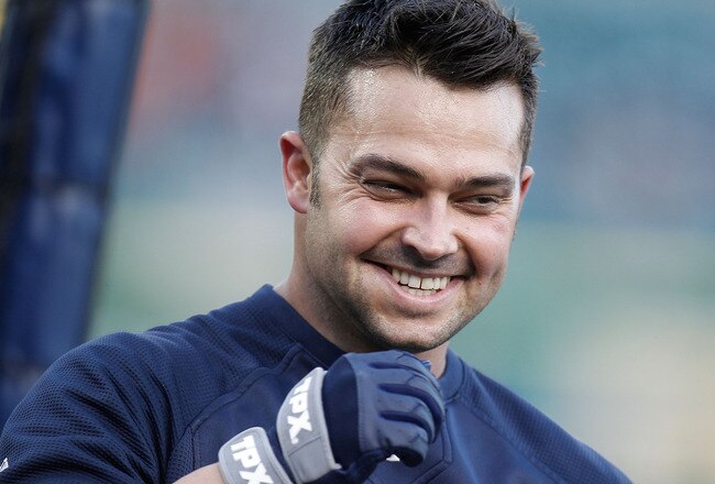 DETROIT, MI - OCTOBER 04: Nick Swisher #33 of the New York Yankees smiles during batting practice prior to playing the Detroit Tigers in game four of the American League Division Series at Comerica Park on October 4,  2011 in Detroit, Michigan. (Photo by Gregory Shamus/Getty Images)