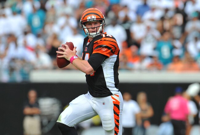 JACKSONVILLE, FL - OCTOBER 09:  Quarterback Andy Dalton #14 of the the Cincinnati Bengals looks to pass against the Jacksonville Jaguars October 9, 2011 at EverBank Field in Jacksonville, Florida. The Bengals won 30 - 20. (Photo by Al Messerschmidt/Getty Images)