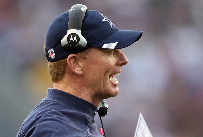 FOXBORO, MA - OCTOBER 16:  Head coach Jason Garrett of the Dallas Cowboys discusses a call with the referee in the first half against the New England Patriots on October 16, 2011 at Gillette Stadium in Foxboro, Massachusetts.  (Photo by Elsa/Getty Images)