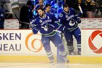 VANCOUVER, BC - JUNE 04:  Ryan Kesler #17 and Kevin Bieksa #3 of the Vancouver Canucks take to the ice prior to playing against the Boston Bruins in Game Two of the 2011 NHL Stanley Cup Final at Rogers Arena on June 4, 2011 in Vancouver, British Columbia, Canada.  (Photo by Harry How/Getty Images)