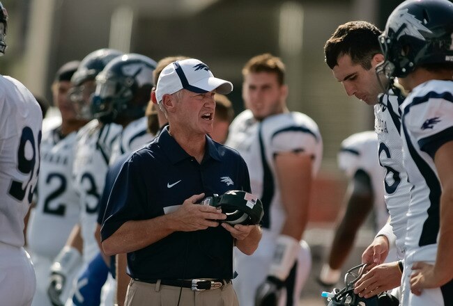 BOISE, ID - OCTOBER 01:  Head Coach Chris Ault  of the Nevada Wolf Pack talks with his players during the game against the Boise State Broncos at Bronco Stadium on October 1, 2011 in Boise, Idaho.  (Photo by Otto Kitsinger III/Getty Images)