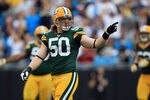 CHARLOTTE, NC - SEPTEMBER 18:   A.J. Hawk #50 of the Green Bay Packers during their game against the Carolina Panthers at Bank of America Stadium on September 18, 2011 in Charlotte, North Carolina.  (Photo by Streeter Lecka/Getty Images)