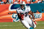 MIAMI GARDENS, FL - SEPTEMBER 18:  Miami Dolphins running back Daniel Thomas #33 runs for yardage during a game against the Houston Texans at Sun Life Stadium on September 18, 2011 in Miami Gardens, Florida.  (Photo by Sam Greenwood/Getty Images)