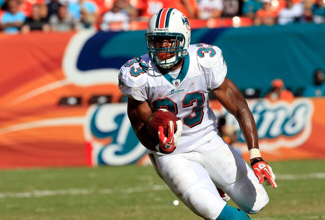 MIAMI GARDENS, FL - SEPTEMBER 18:  Miami Dolphins running back Daniel Thomas #33 runs for yardage during a game against the Houston Texans at Sun Life Stadium on September 18, 2011 in Miami Gardens, Florida.  (Photo by Sam Greenwood/Getty Images)