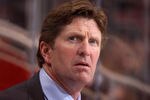 GLENDALE, AZ - OCTOBER 22:  Head coach Mike Babcock of the Detroit Red Wings watches from the bench during the NHL game against the Phoenix Coyotes at Jobing.com Arena on October 22, 2009 in Glendale, Arizona. The Coyotes defeated the Red Wings 3-2 in overtime.  (Photo by Christian Petersen/Getty Images)