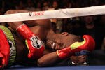 LOS ANGELES, CA - OCTOBER 15:  Bernard Hopkins lies on the canva in pain after falling and injuring his shoulder in the second round against Chad Dawson in their WBC and Ring Magzine light heavyweight title fight at Staples Center on October 15, 2011 in Los Angeles, California. Hopkins was unable to continue and Dawson was awarded a TKO victory.   (Photo by Stephen Dunn/Getty Images)