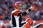 CINCINNATI - OCTOBER 31:  Carson Palmer #9 of  the Cincinnati Bengals gives instructions to his team during the NFL game against the Miami Dolphins at Paul Brown Stadium on October 31, 2010 in Cincinnati, Ohio.  (Photo by Andy Lyons/Getty Images)