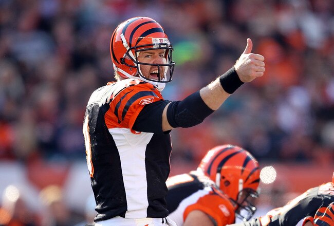CINCINNATI - OCTOBER 31:  Carson Palmer #9 of  the Cincinnati Bengals gives instructions to his team during the NFL game against the Miami Dolphins at Paul Brown Stadium on October 31, 2010 in Cincinnati, Ohio.  (Photo by Andy Lyons/Getty Images)