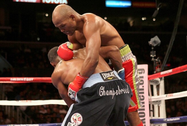 LOS ANGELES, CA - OCTOBER 15:  Bernard Hopkins (R) tangles with Chad Dawson as he falls to the canvas  in their WBC and Ring Magzine light heavyweight title fight at Staples Center on October 15, 2011 in Los Angeles, California. Hopkins injured his shoulder and was unable to continue and Dawson was awarded a TKO victory.  (Photo by Stephen Dunn/Getty Images)