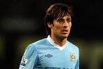 MANCHESTER, ENGLAND - AUGUST 15:  David Silva of Manchester City looks on during the Barclays Premier League match between Manchester City and Swansea City at Etihad Stadium on August 15, 2011 in Manchester, England.  (Photo by Chris Brunskill/Getty Images)