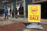 LONDON, ENGLAND - APRIL 11:  A sale sign is displayed outside the fan shop of Arsenal Football Club's Emirates Stadium on April 11, 2011 in London, England. American businessman Stan Kroenke's company 'Kroenke Sports Enterprises' has increased its shareholding in Arsenal to 62.89% and will make an offer for a full takeover of the club. Kronke first purchased 9.9% of Arsenal shares in 2007. Today's deal values the Premier League club at 731m GBP.  (Photo by Oli Scarff/Getty Images)