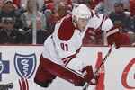 DETROIT, MI - APRIL 16: Kyle Turris #91 of the Phoenix Coyotes skates with the puck while playing the Detroit Red Wings in Game Two of the Western Conference Quarterfinals during the 2011 Stanley Cup Playoffs at Joe Louis Arena on April 16, 2011 in Detroit, Michigan.  (Photo by Gregory Shamus/Getty Images)