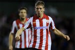 BILBAO, SPAIN - JANUARY 05:  Iker Muniain of Athletic Bilbao controls the ball during the round of last 16 Copa del Rey second leg match between Athletic Bilbao and FC Barcelona at Estadio de San Mames on January 5, 2011 in Bilbao, Spain. The match ended in a 1-1 draw with Barcelona advancing to the quarter final.  (Photo by Jasper Juinen/Getty Images)