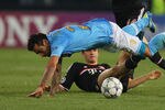 NAPLES, ITALY - OCTOBER 18:  Ezequiel Lavezzi of SSC Napoli takes a tumble during the UEFA Champions League Group A match between SSC Napoli and FC Bayern Muenchen at Stadio San Paolo on October 18, 2011 in Naples, Italy.  (Photo by Paolo Bruno/Getty Images)
